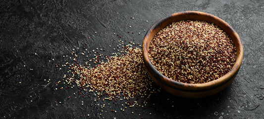 Set of quinoa Red, white and brown quinoa. On a black background. Top view. Free copy space.