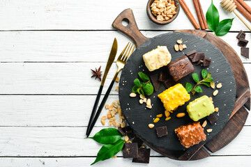 Set of colored cookies. Candy bar. Top view. Rustic style.