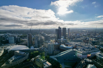 Fototapeta na wymiar Manchester City Centre Drone Aerial View Above Building Work Skyline Construction Blue Sky Summer 2022