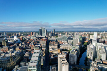 Fototapeta na wymiar Manchester City Centre Drone Aerial View Above Building Work Skyline Construction Blue Sky Summer 2022