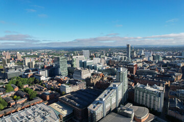 Fototapeta premium Manchester City Centre Drone Aerial View Above Building Work Skyline Construction Blue Sky Summer 2022 Beetham Tower Deansgate Square