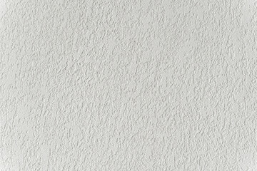 White wall with plaster background. Plaster and putty grain surface texture. Finishing, decor...