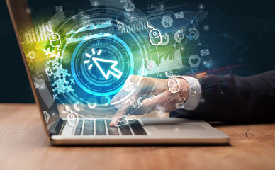 Business hand typing on a modern laptop