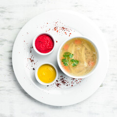 Meat jellies with mustard and beet sauce. Cold snacks. Top view