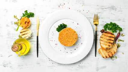 Stewed cabbage with onions on a plate. Top view.