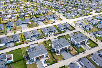 Houses aerial birds eye view. Aerial view of a typical suburb in Poland. Modern architecture and...