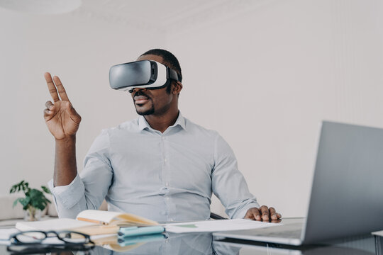 African american man in vr glasses. Modern digital technology for business and creativity.