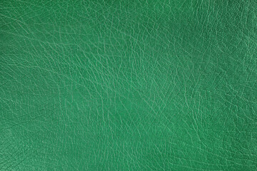 Natural, artificial green leather texture background. Material for sport items, clothes, furnitre...