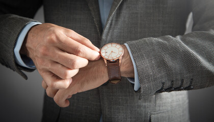 Businessman wearing luxury wristwatch. Fashion, Lifestyle