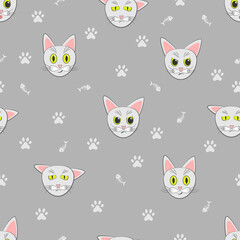 Vector cats seamless pattern. Repeating cat background of cat's faces, paws and fishbones on gray.