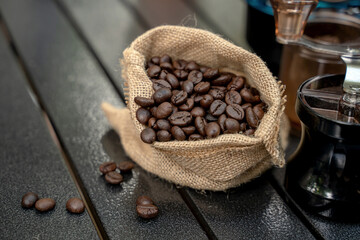 Dripping hot coffee and camping near river at nature park. Outdoor activity and relax on holiday.