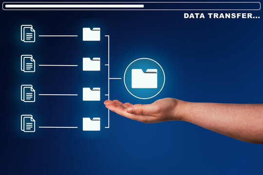 Businesswoman using a computer with folder storage diagram. Data safe. Networking and internet service concept.