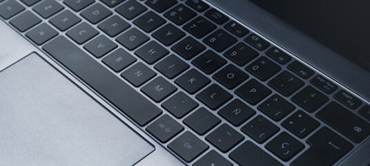 Close up of laptop keyboard. Technology concept with copy space. Internet of things.