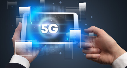 Close-up of a hand holding tablet