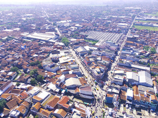 Fototapeta na wymiar Abstract Defocused Aerial photography Public highway that divides the dense and spacious residential area of Majalaya - Indonesia, Not Focus