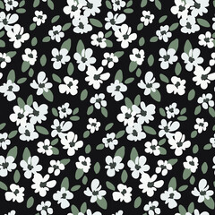 Seamless floral pattern in monochrome. Cute ditsy print, liberty botanical background with small hand drawn plants, white flowers, dark leaves on a black field. Vector illustration.
