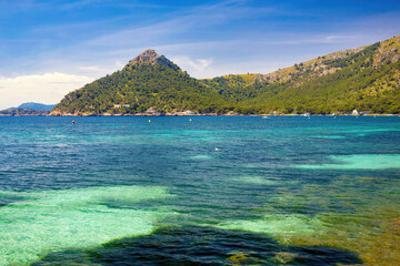 Obraz premium View from Formentor beach of the high mountains that surround it. Pollensa, Majorca island, Balearic Islands, Spain