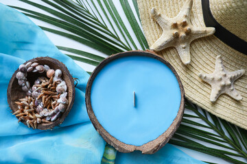 original handmade soy wax candle in coconut, palm branch and sea shells