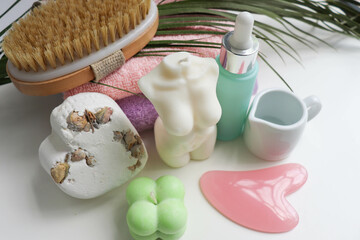spa theme. pastel colored towels, aroma candles, massagers and spa accessories