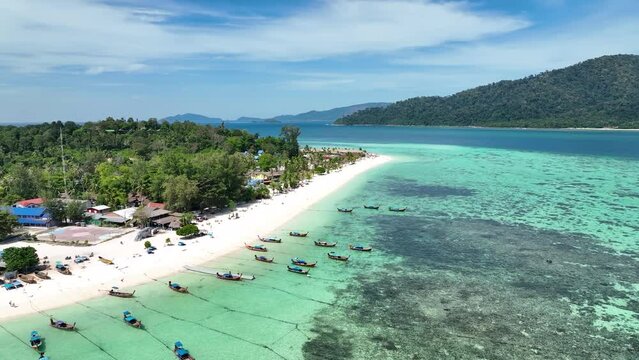 erial view with summer tropical islands in the ocean - as local boat coral reef as white sand beach and turquoise water background
