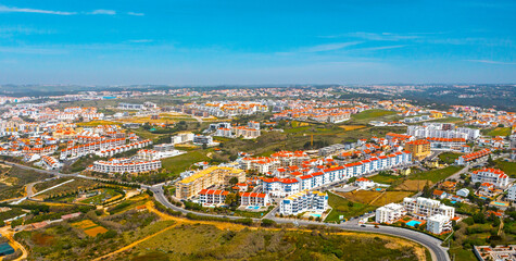 Aerial view - Beautiful European touristic town Ericeira,  Portugal. Top view of tourist region of Portugal. Beautiful cityscape with skyline.