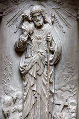 Fototapeta na wymiar Sculpture depicting Jesus as a shepherd in Notre Dame de Bayeux cathedral