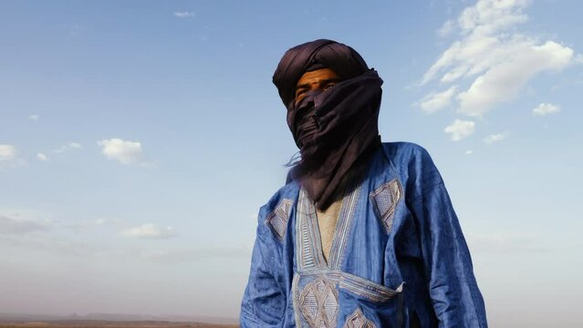 Portrait of a Moroccan man wearing a turban. Authentic Bedouin of South Morocco. 4k.