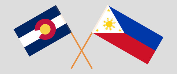Crossed flags of The State of Colorado and the Philippines. Official colors. Correct proportion