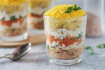 Mimosa salad in transparent glass