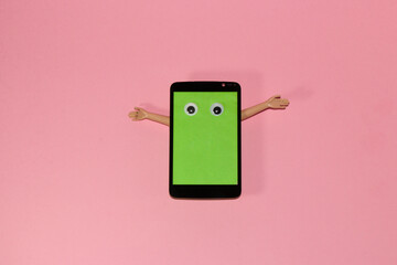 mobile phone with green screen as copy space wants to hug you, creative modern abstract techno wallpaper, pink background
