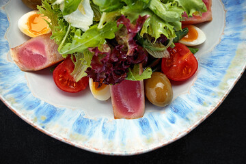 Nicoise salad with tuna, on a plate