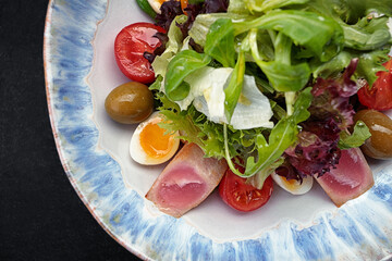 Nicoise salad with tuna, on a plate