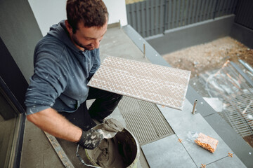 Home improvement, renovation works and worker details - construction worker tiler tiling, ceramic...