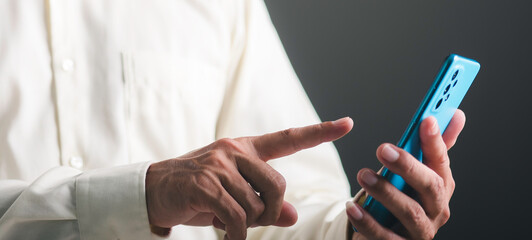 young businessman using mobile phone to make business communication through modern network systems