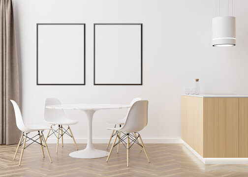 Two empty vertical picture frames on white wall in modern dining room. Mock up interior in contemporary, scandinavian style. Free space for picture, poster. Table, chairs. 3D rendering.