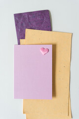 blank paper cards and pink fabric heart