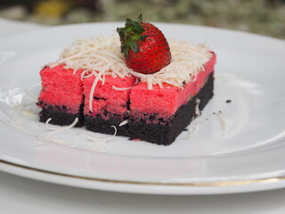 cheesecake with strawberries serve in a plate for desert 