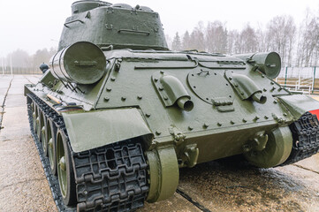 Soviet medium tank. The most massive tank of the Second World War. Armament of the Soviet army. Exhaust pipes of a medium Soviet tank.