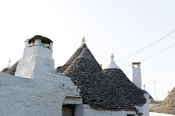 Fototapeta na wymiar Unique Trulli houses with conical roofs in Alberobello, Italy.