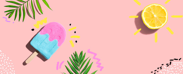 Summer concept with lemon sunlight with a popsicle - flat lay