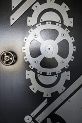 Iron door with gears