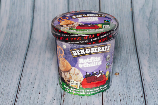 Ben And Jerry Netflix And Chill Original Flavour Ice Cream. Famous Brand Frozen Dessert On Cardboard Packaging With Content Details.