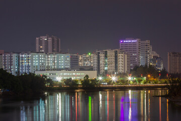 Saigon, Vietnam - Jun 21, 2021 - Impression landscape of Ho Chi Minh city at night, Saigon river flows through the city