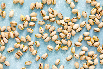 Pistachios. Pistachio nuts background. Healthy natural vegetarian organic food. Top view, copy space