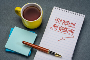 keep working, not worrying - inspirational reminder in a notebook, positive mindset and personal development concept