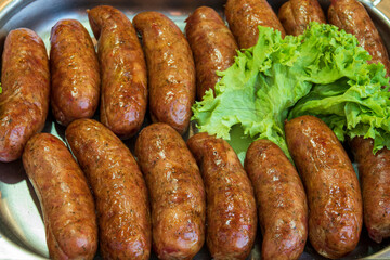 Tasty bbq sausages with salad