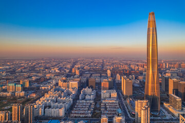 Aerial shot of city high-rise in the evening