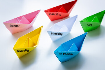 Handmade, colorful paper ships, a variety of symbols, the concept of tolerance and acceptance of various social, ethnic and gender groups, creative concept of equality of belonging, - obrazy, fototapety, plakaty