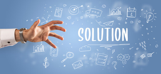 Close-Up of cropped hand pointing at business inscription