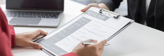 Employer or HR department is reading the resume and interviewing the ability of new employees,...
